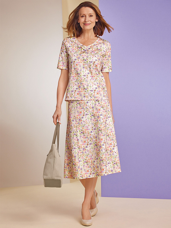 a classic matures women's floral printed jersey skirt with a matching ruched neckline T-shirt.